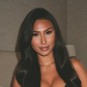 Reina, 32, a dark-haired Japanese woman