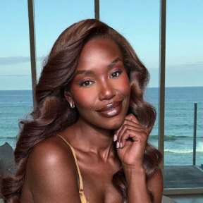 Simone, 39, a brunette African American woman